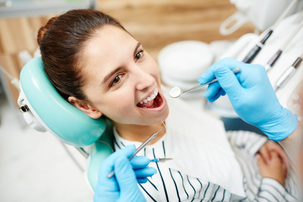 Best Places for Dental Tourism in the World 2 checking teeth G7H3KGF min
