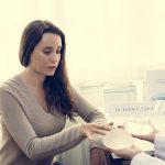 woman planning on having a breast implant P2UBFN4 min