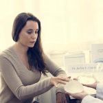 woman planning on having a breast implant P2UBFN4 min