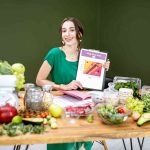 portrait-of-the-dietitian-with-healthy-food-in-the-2021-11-02-20-09-19-utc-min